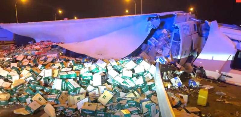 Beer flows across M-50 in Madrid after truck overturns
